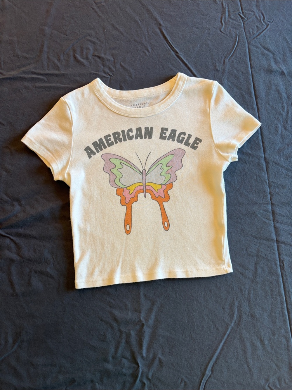 American Eagle Outfitters Cream Tee with Pastel Butterfly Graphic